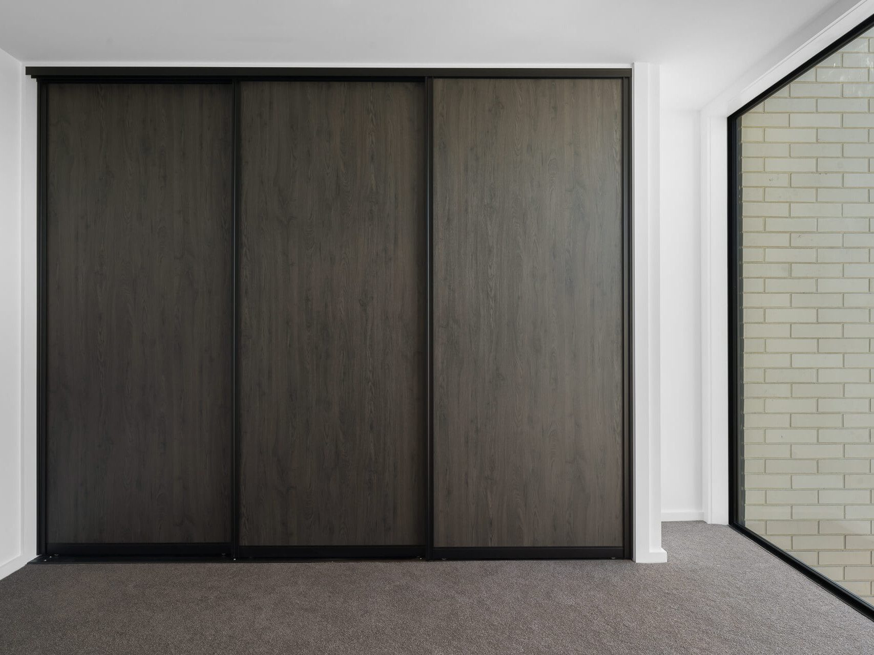 Aristo sliding wardrobe doors and Flex reach-in wardrobe organsier