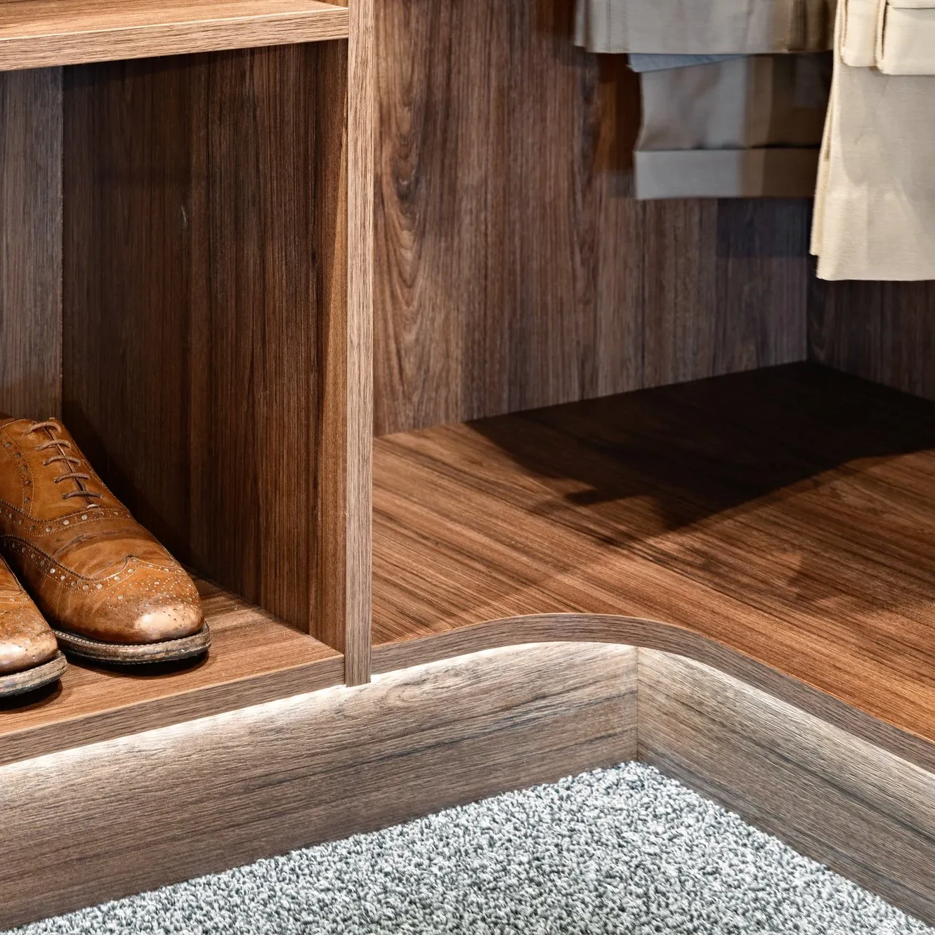 Luxe walk-in wardrobe design in Prime Hickory Walnut