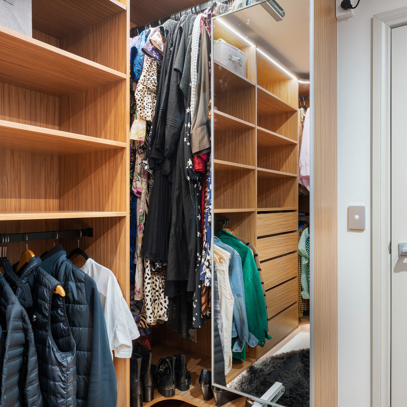 Close up of pull-out mirror in the Luxe walk-in wardrobe